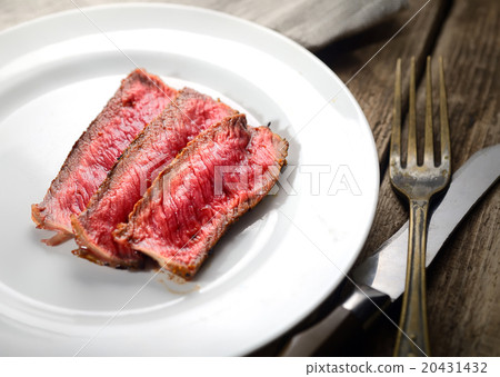 图库照片: rare steak medium