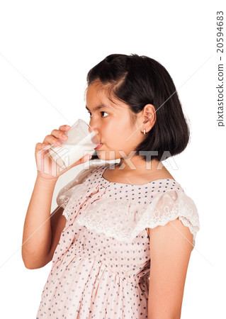 图库照片: cute little girl drink milk