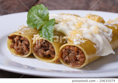 图库照片: italian cannelloni pasta with meat, bechamel sauce