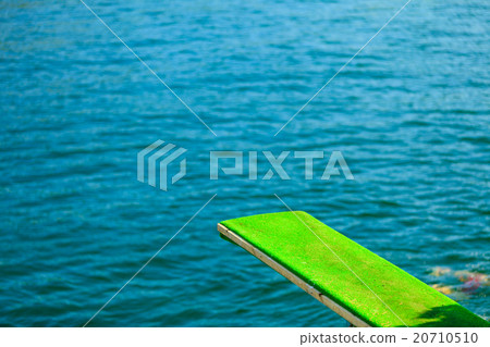 图库照片: view of diving board. springboard to dive at water.