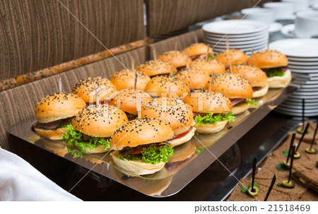 图库照片: catering - served table with hamburgers snack