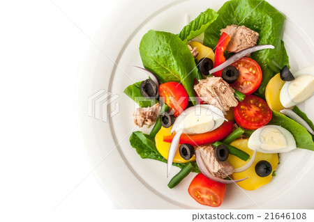 图库照片: nicoise salad on the white background top view