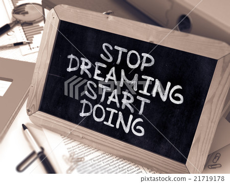 插图素材 stop dreaming start doing chalkboard with hand