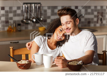 图库照片: happy couple having breakfast together