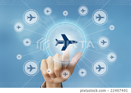 图库照片: business hand press flight trip button