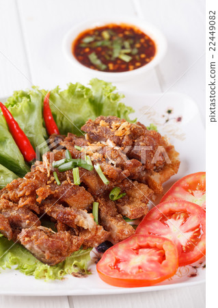 图库照片: streaky pork fried with spicy dipping sauce