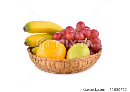 图库照片: mixed fruit, banana, orange, pear, grape in basket