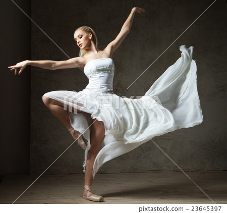 图库照片: beautiful ballet dancer in white costume with