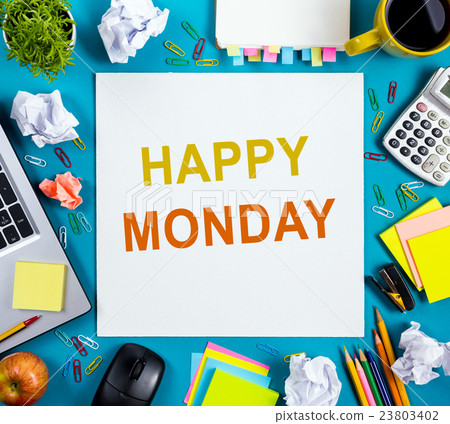 图库照片: happy monday. office table desk with supplies