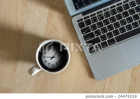 图库照片: top view of laptop, notepad and coffee cup which shown