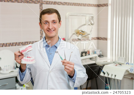 图库照片 young dentist in the office