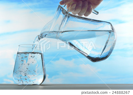 图库照片: fresh and clean drinking water in jug and glass