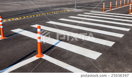 图库照片: white traffic markings with a pedestrian crossing