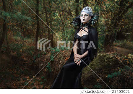 图库照片: gothic girl in the forest.