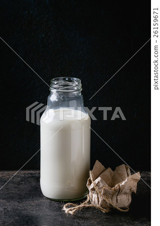 图库照片: glass bottle of milk