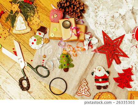 图库照片: handmade christmas gifts in mess with toys