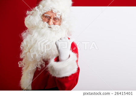 图库照片: photo of happy santa claus in eyeglasses looking at