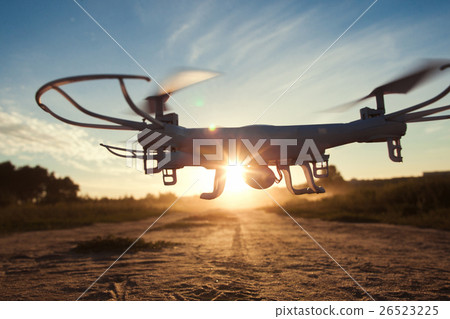 图库照片: drone flying on sunset light close-up, free space