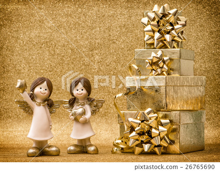 图库照片: little angels with gifts. ribbon bow on golden