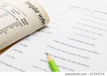 图库照片: english exercise and text book on table