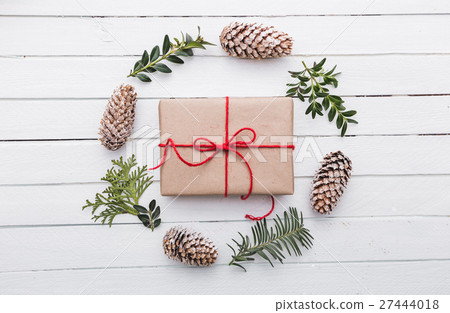 图库照片: top view of christmas gift wrapped in craft and