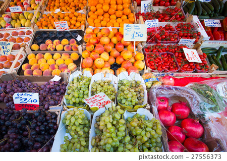 图库照片: fruit market with colorful fruits and vegetables