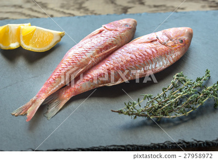 图库照片: raw red mullet with ingredients