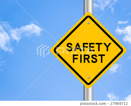 图库照片: safety first road sign