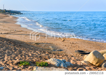 图库照片 dirty beach of the caspian sea derbent