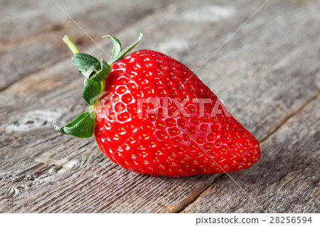 图库照片: one fresh big red strawberry