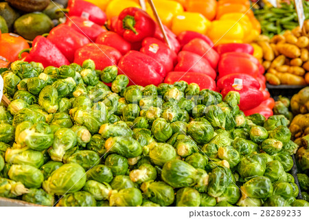 图库照片: fresh organic fruits and vegetables at market