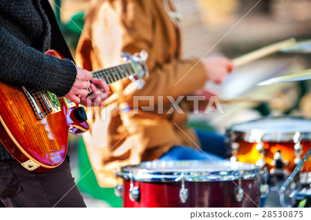 friends playing on percussion