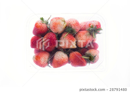 图库照片: strawberry juicy fruit in plastic bag packaging