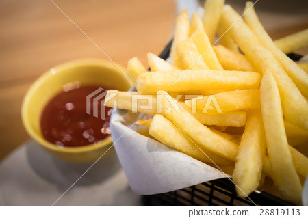 图库照片: fried potato and ketchup with selective focus