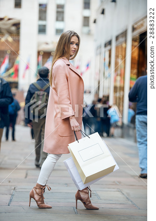 图库照片: beautiful girl with shopping bags