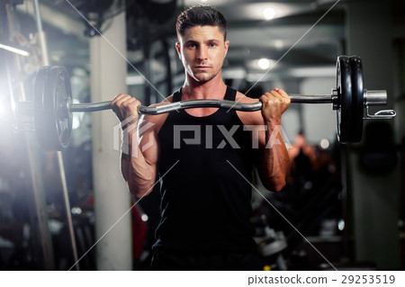 图库照片 handsome man workout in gym