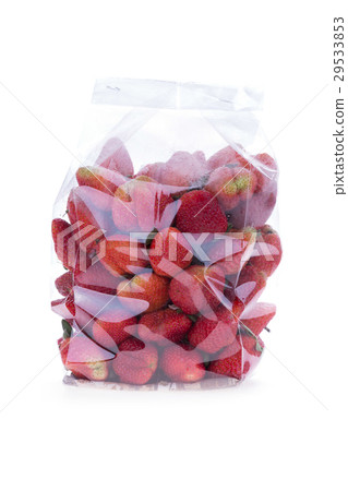 图库照片: strawberry juicy fruit in plastic bag packaging