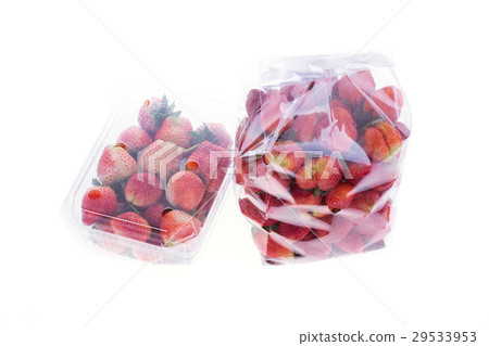 图库照片: strawberry juicy fruit in plastic bag packaging