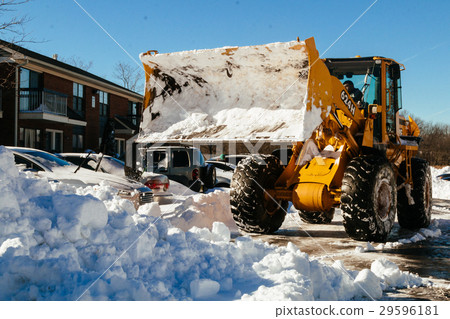 图库照片 snow removal vehicle removing