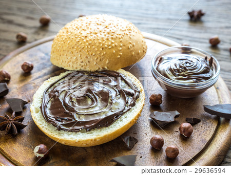 图库照片: seasame bun with chocolate cream and nuts