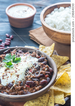 图库照片: bowl of chili con carne with white rice