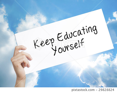 图库照片: keep educating yourself sign on white paper.