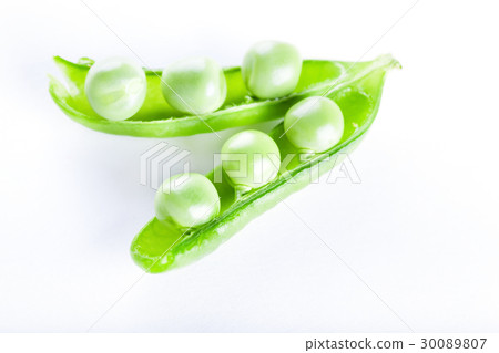 图库照片: open green pea pod