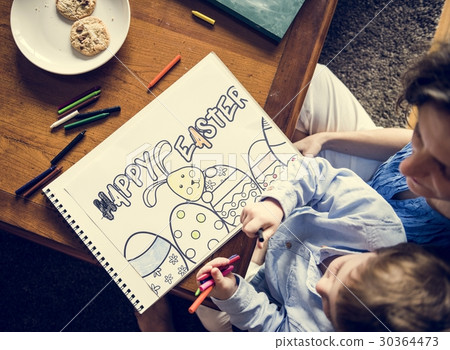 drawing picture,drawingpicture 图库照片: little boy drawing a picture about easter