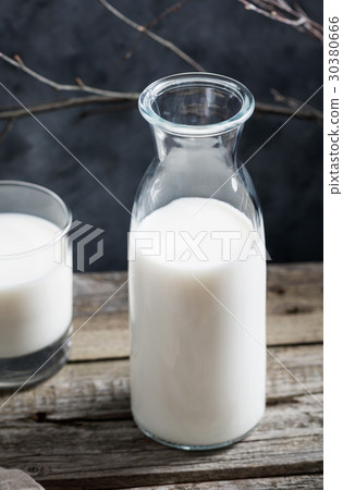 图库照片 close-up of a glass of milk and an open glass milk