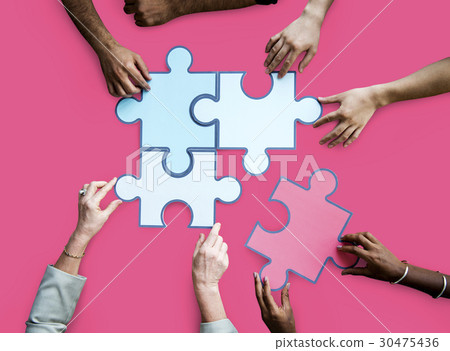 图库照片: togetherness connection teamwork jigsaw game