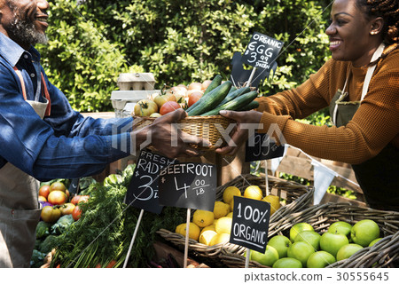 图库照片: greengrocer preparing organic fresh agricultural