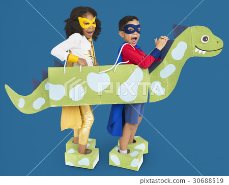 图库照片: little kids superherokids dinosaur costume