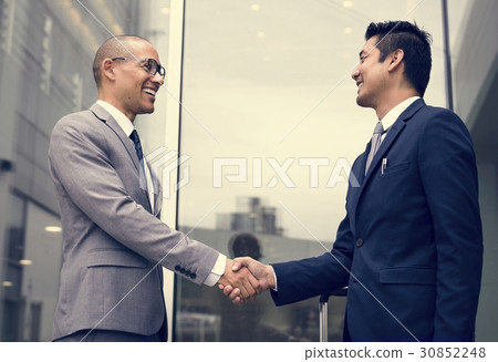 图库照片: business men agreement deal hands shake