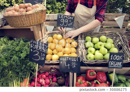 图库照片: greengrocer preparing organic fresh agricultural